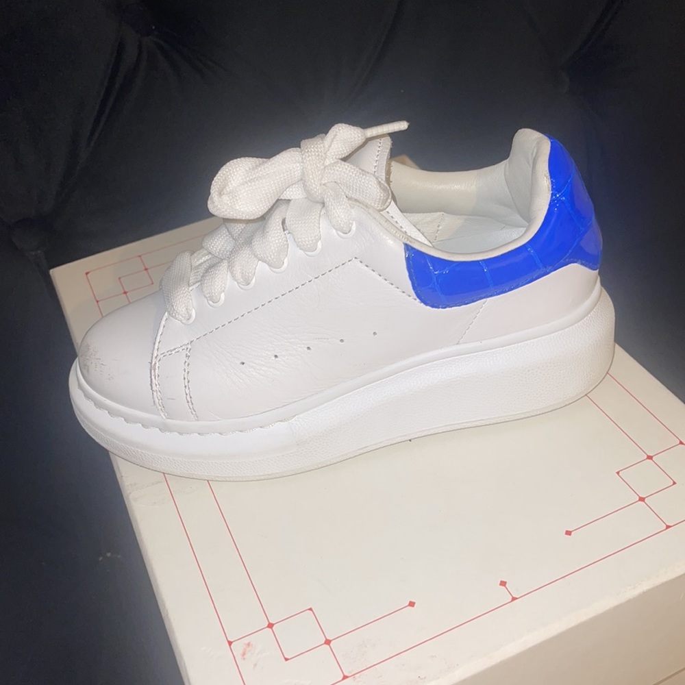 Alexander McQueens white and blue trainers